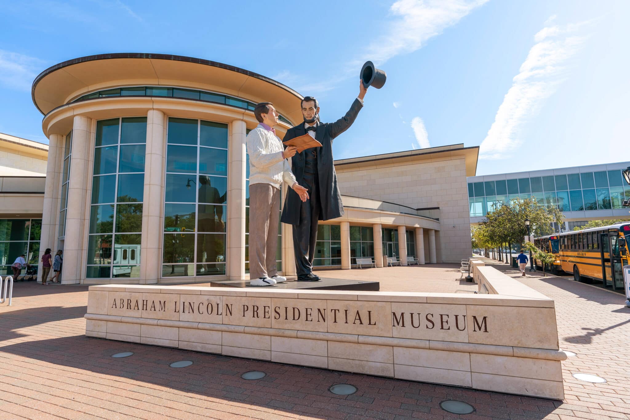 Abraham Lincoln Presidential Museum exterior blue skies and statue